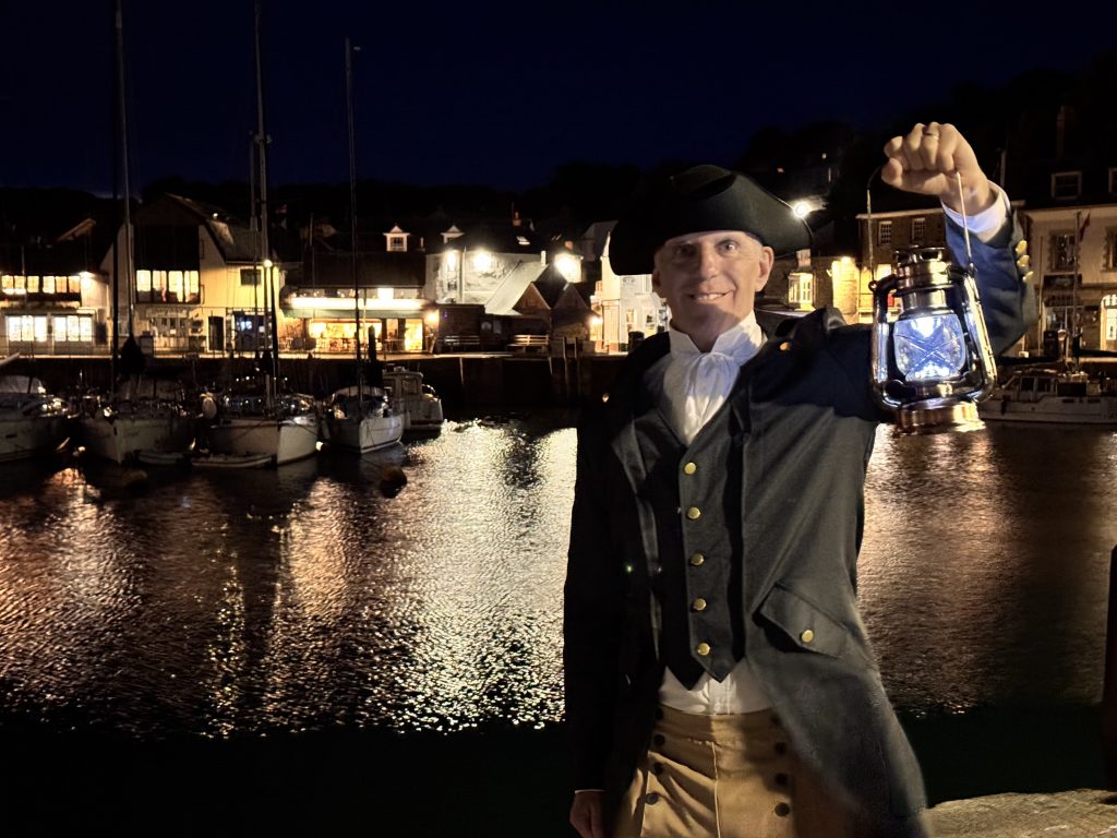 THOMAS Rawlings is shown standing before Padstow Harbour